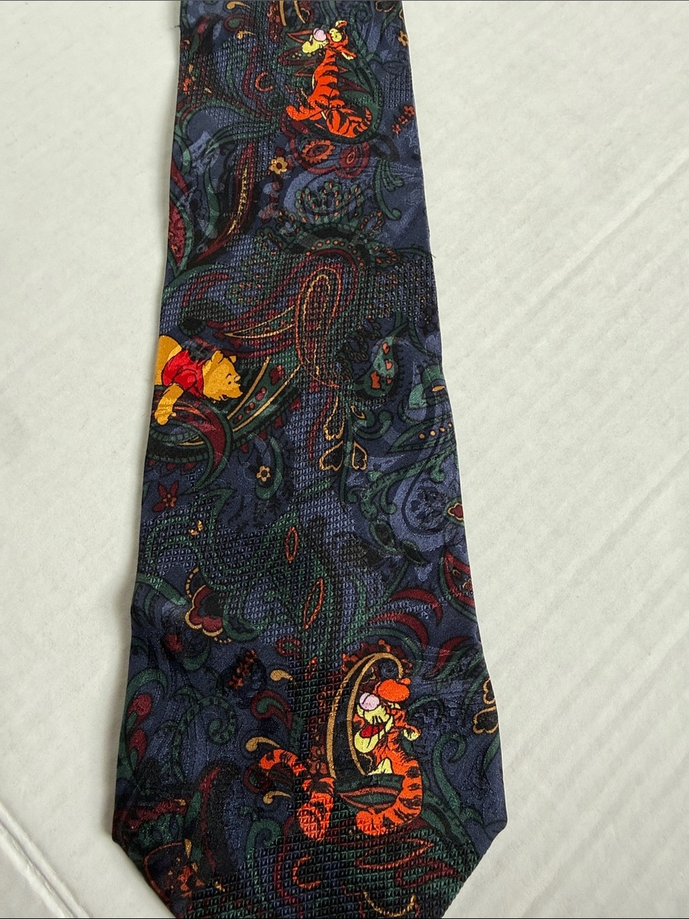 Disney Dark Blue Paisley Tie with Red and Yellow Accents